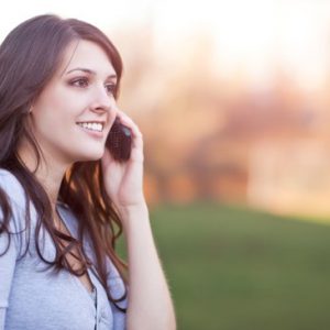 Woman conducting phone interview