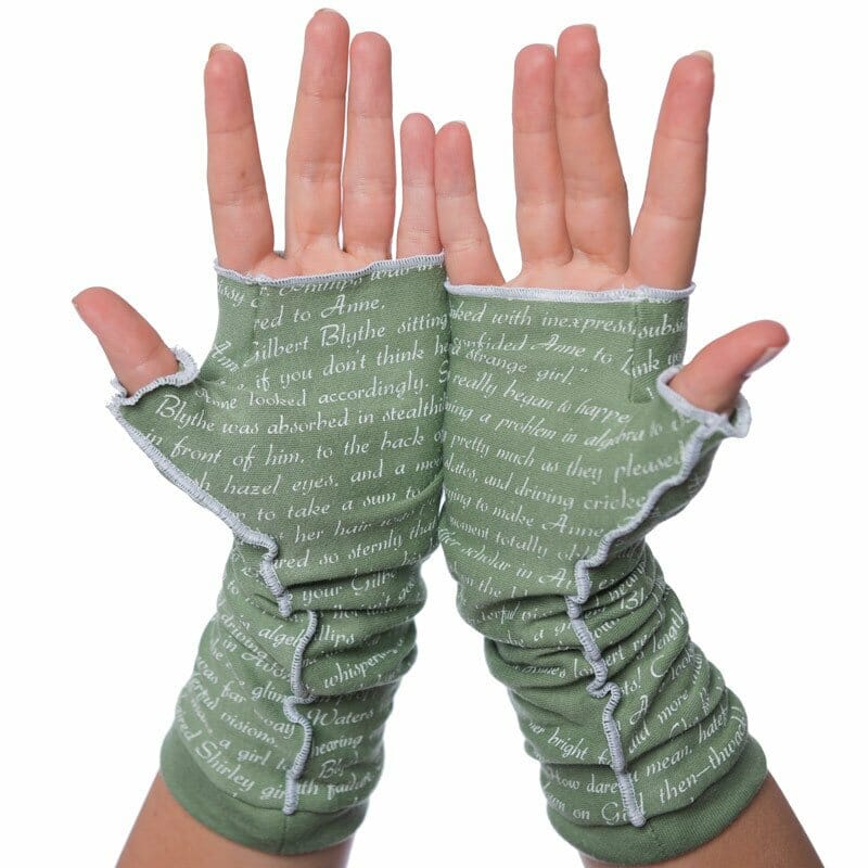 Green fingerless gloves that feature text from a book