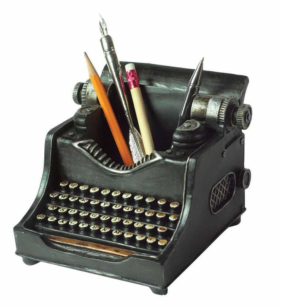 Old typewriter that functions as a pen-holder, to sit on a desk