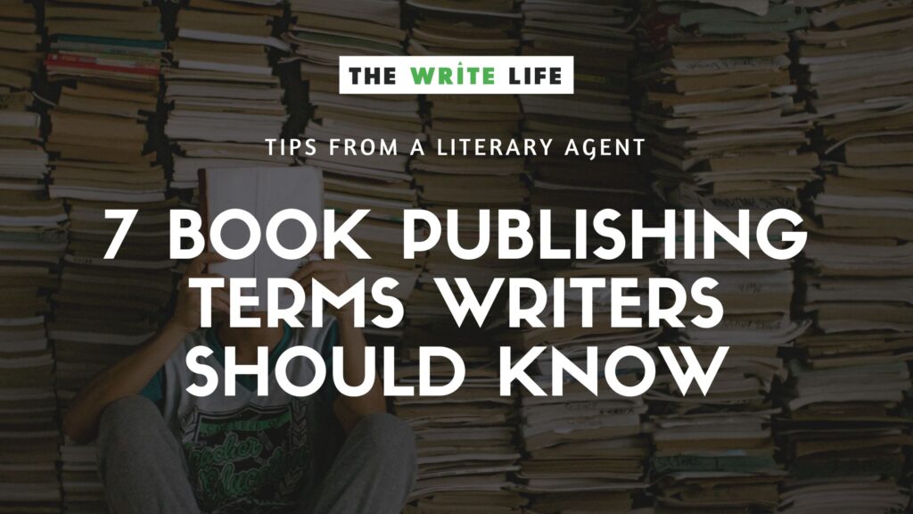 A stock image of huge stacks of books piled from floor to ceiling and a person sitting in front of one pile, reading a book. This is to set the tone for the article called 7 Book Publishing Terms Writers Should Know: A Literary Agent’s Guide